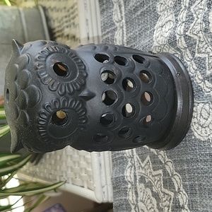 Ceramic  black owl. Holds small candle. Made in Japan. Height 4.5" Base 3".
